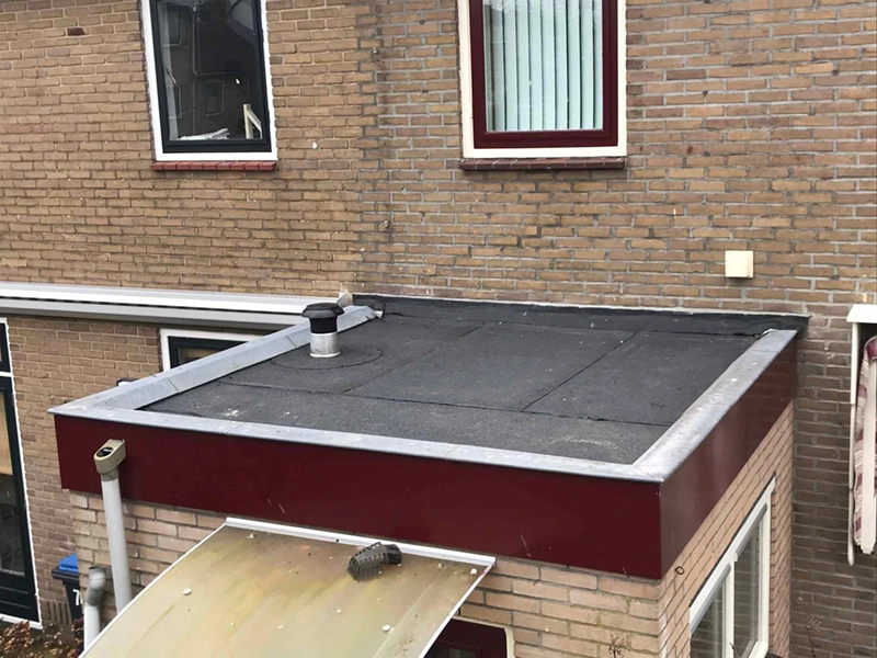 Platdak schuur lekkage